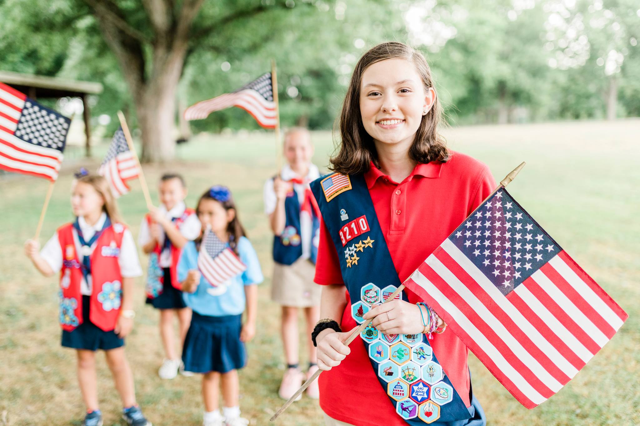 American Heritage Girls members working on a craft project.
