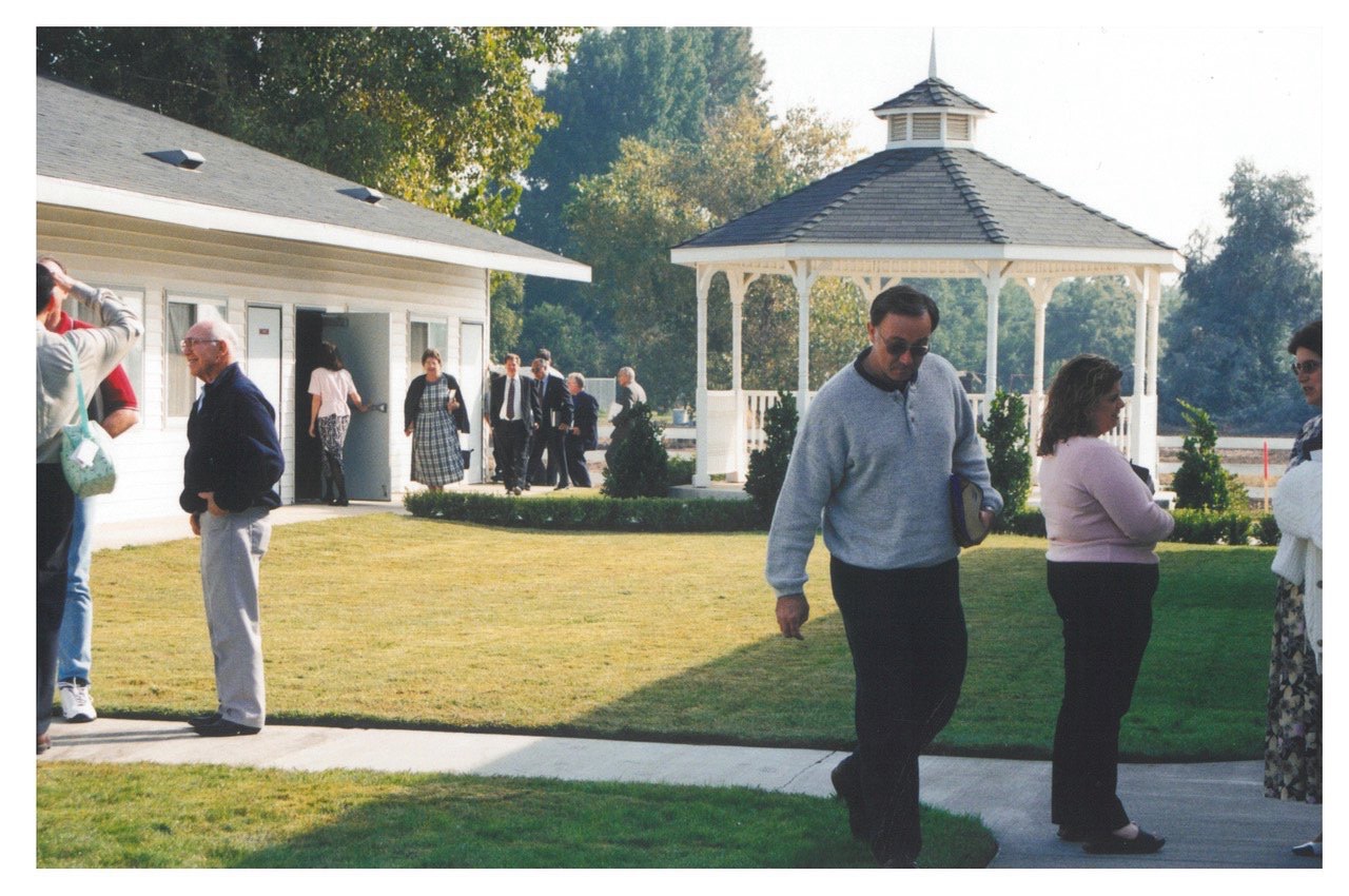 New Hope members walking toward the gazebo and pavilion after a service, late 1990s or early 2000s