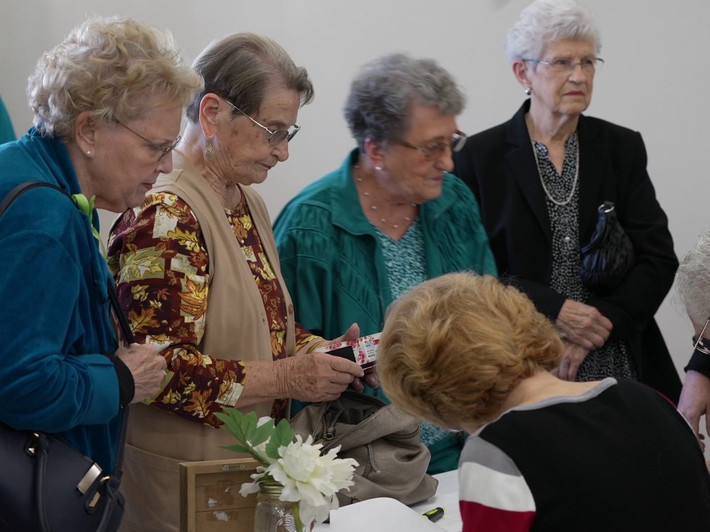 New Hope members smiling and connecting together at a church fellowship gathering
