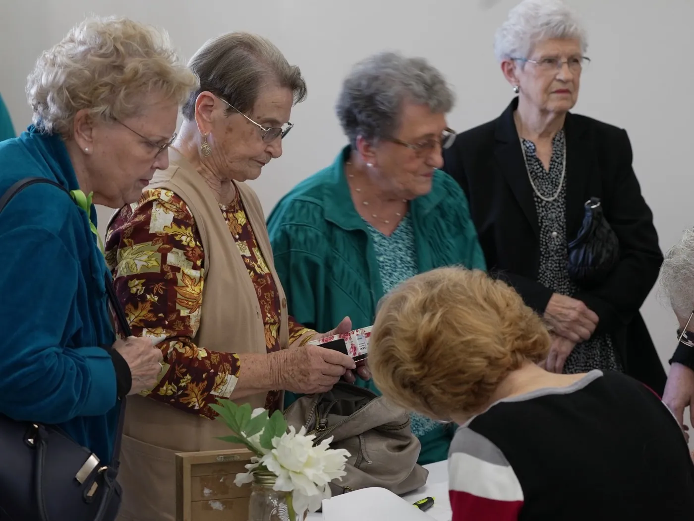 New Hope members smiling and connecting together at a church fellowship gathering