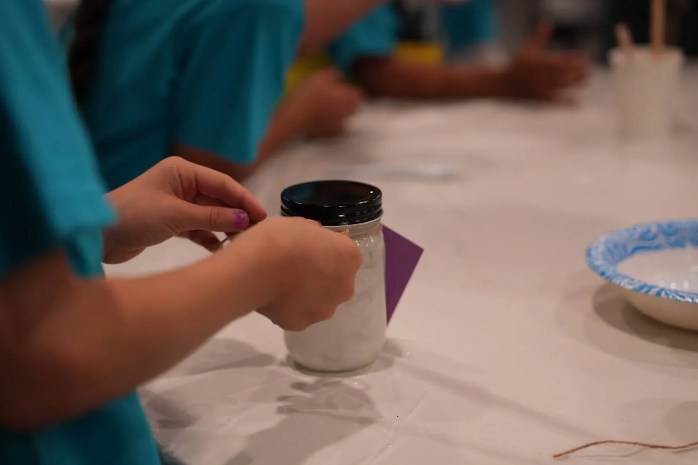 New Hope Kids at a craft table