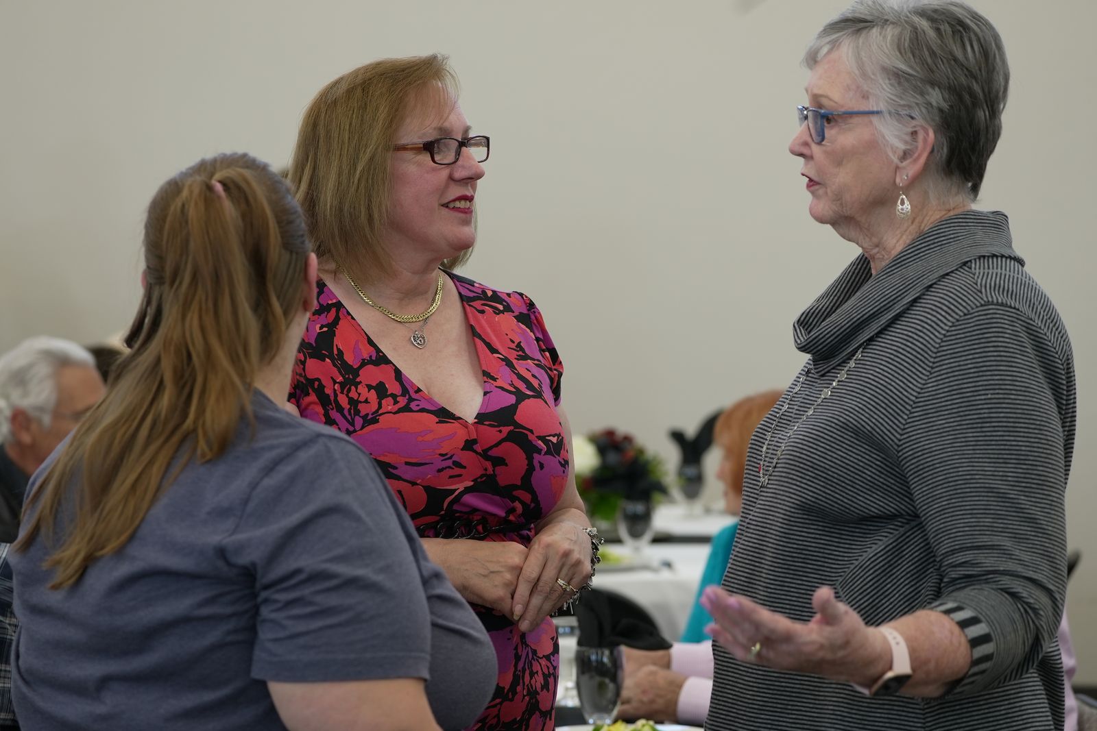 Members in conversation at a New Hope fellowship dinner