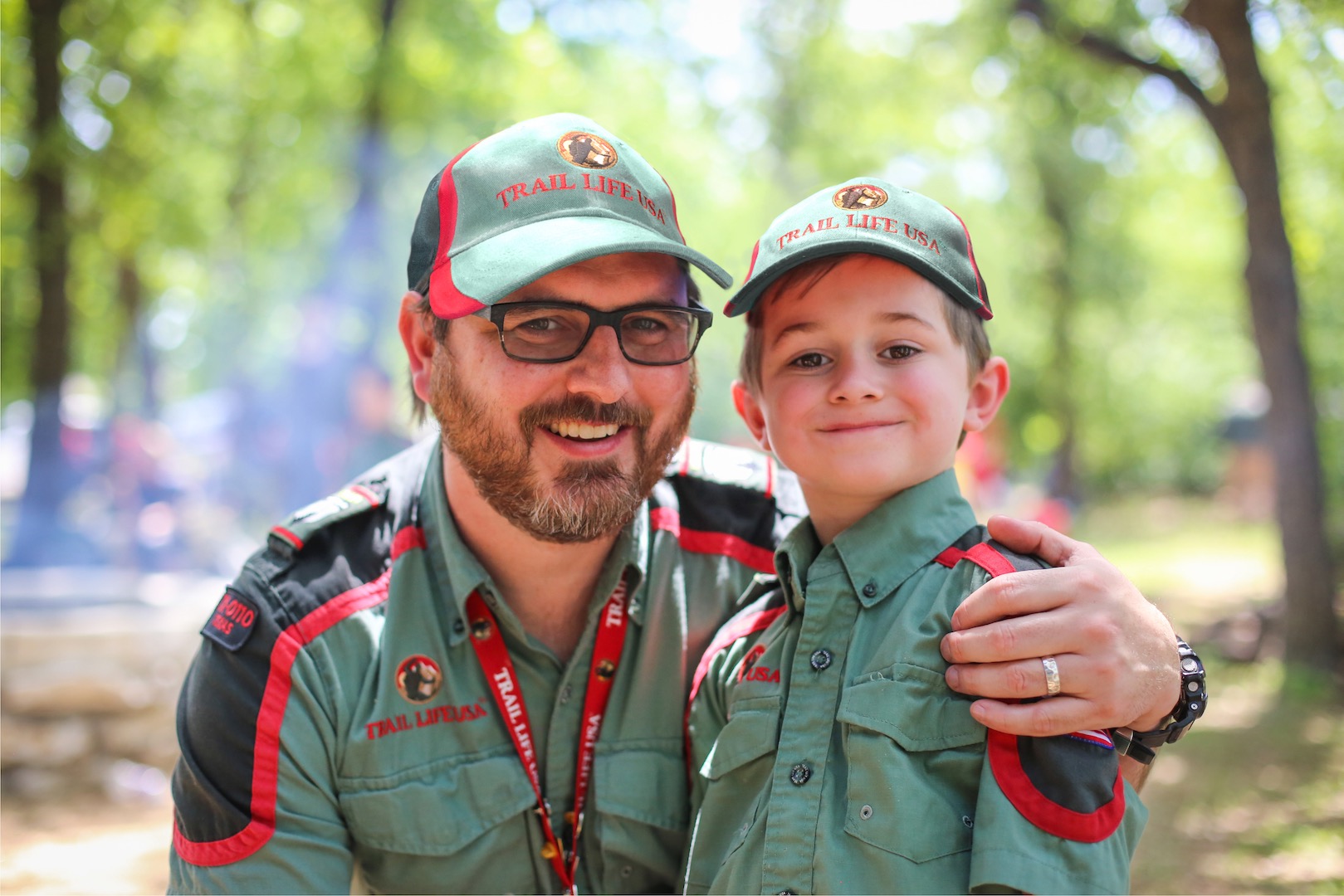 Trail Life and American Heritage Girls father-son moment
