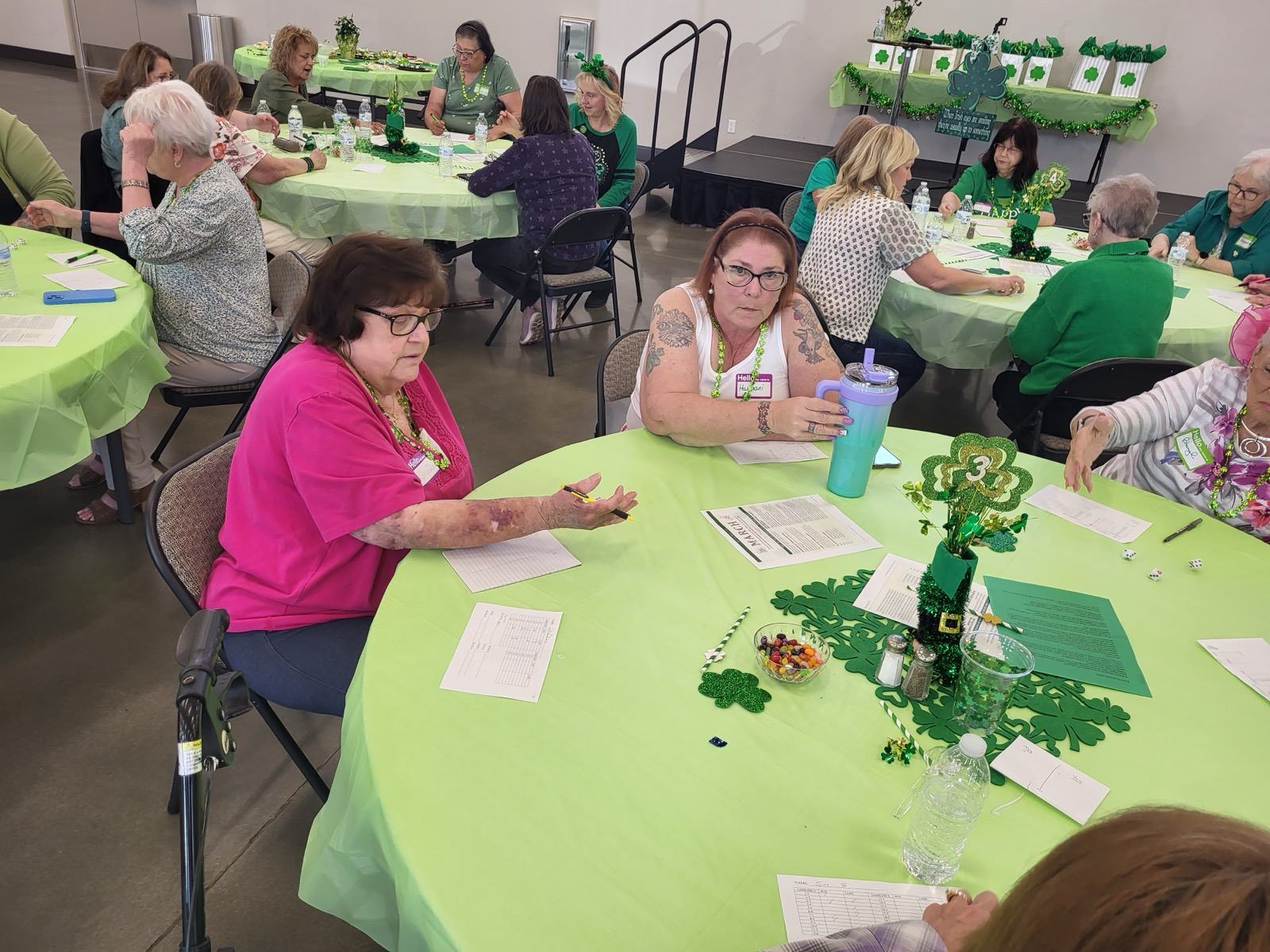 New Hope members talking around tables at a church fellowship gathering in Clovis