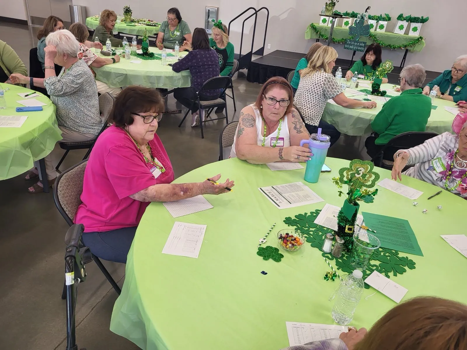 New Hope members talking around tables at a church fellowship gathering in Clovis