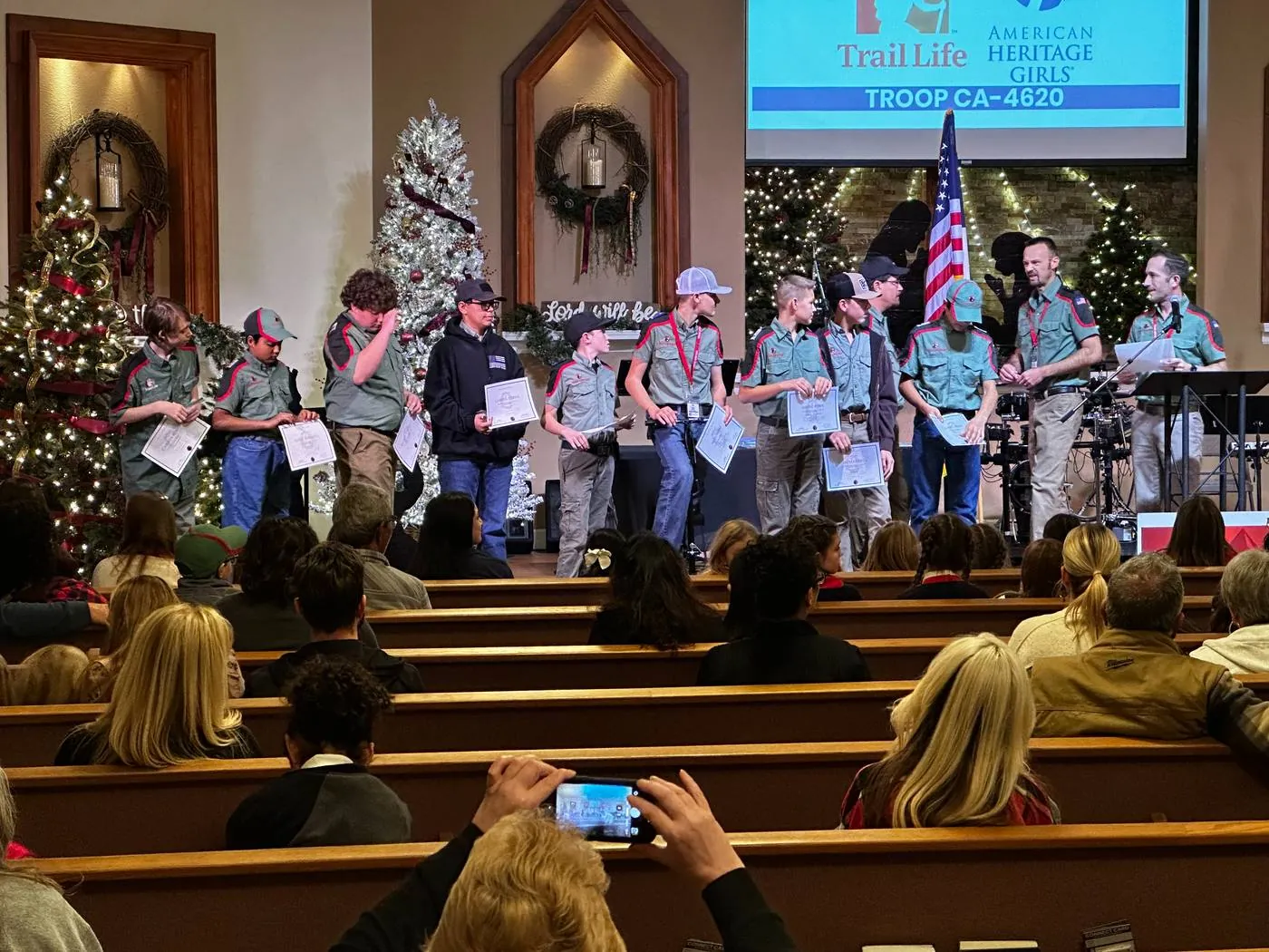American Heritage Girls Troop CA-4620 and Trail Life Troop CA-4620 together on the New Hope stage at a joint ceremony