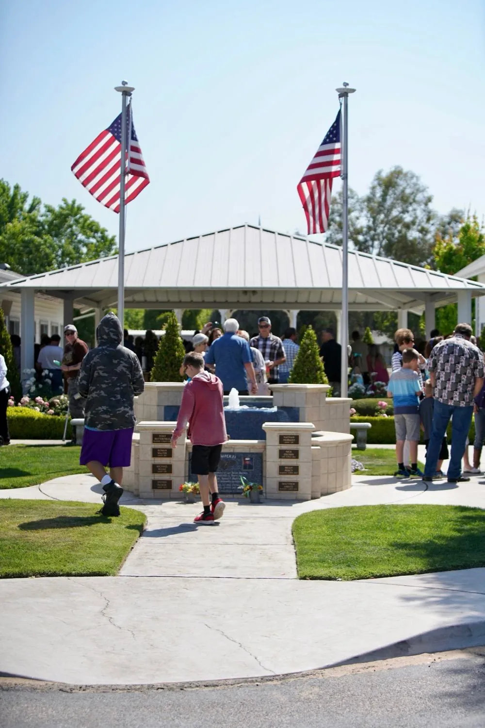 New Hope families gathering at the campus pavilion after a Sunday service in Clovis