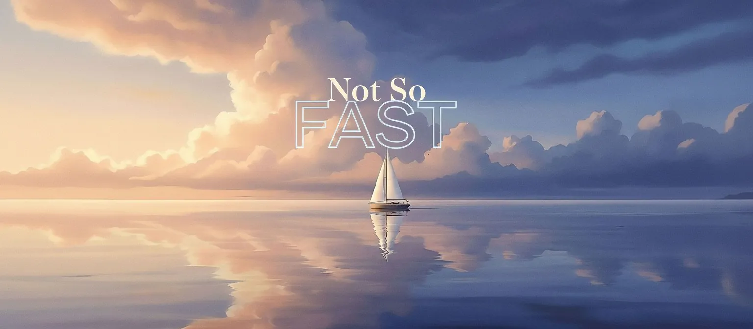 A single sailboat resting on water so still that the sunset clouds are mirrored underneath it