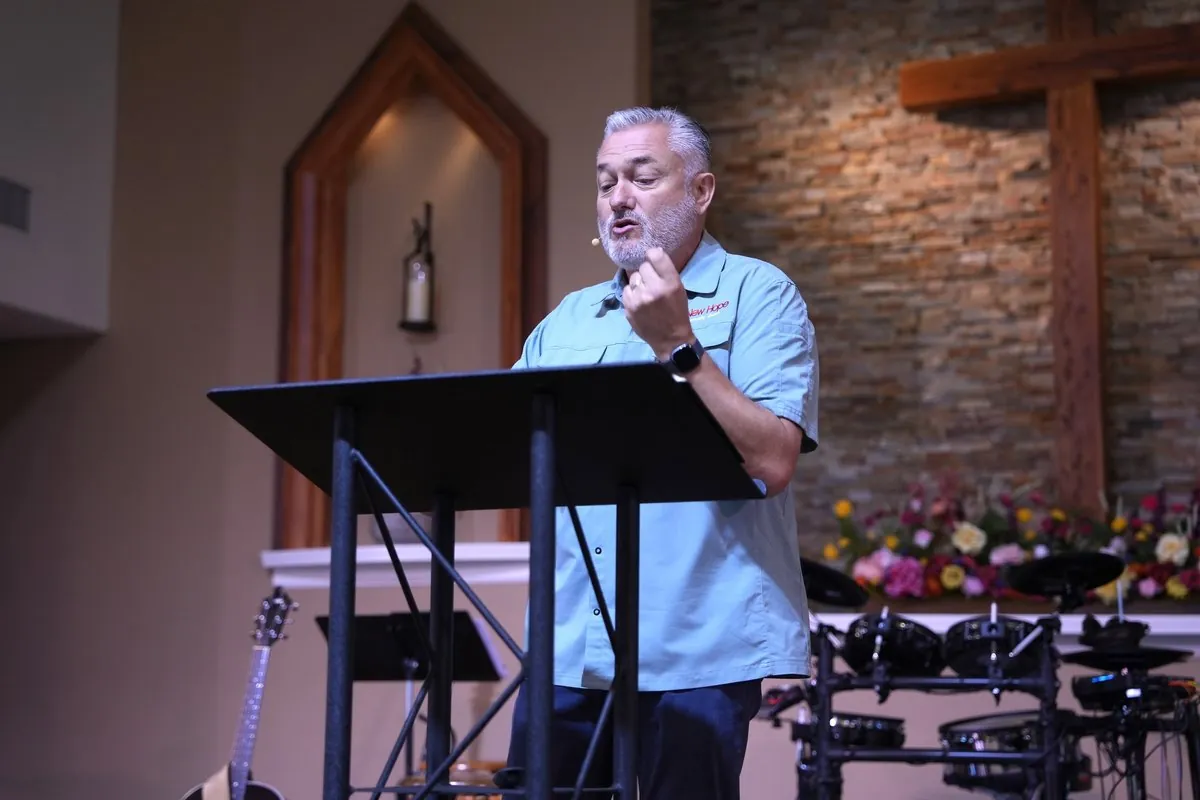 Pastor Mark Addis preaching from the New Hope sanctuary in Clovis