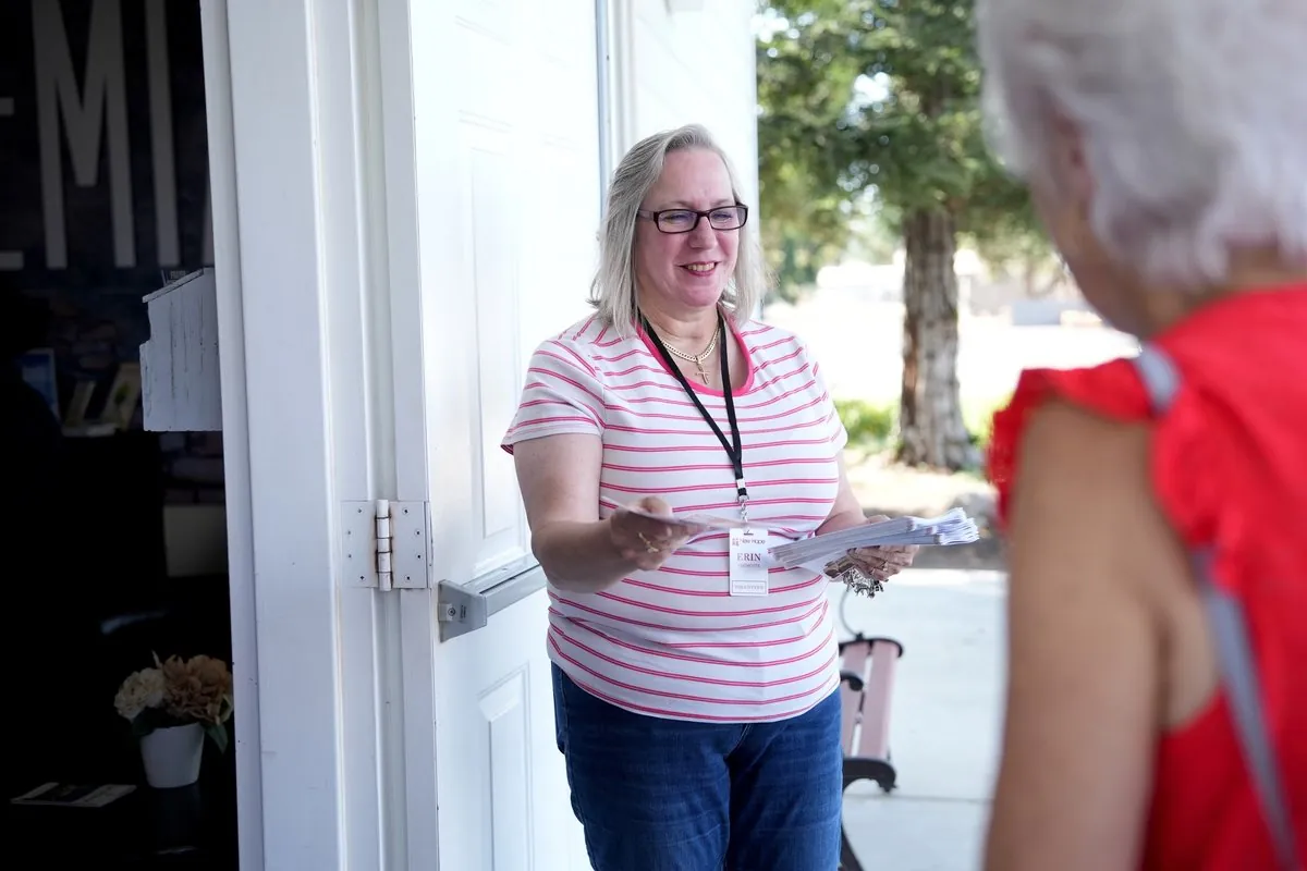 A New Hope greeter welcoming a family on a Sunday morning in Clovis