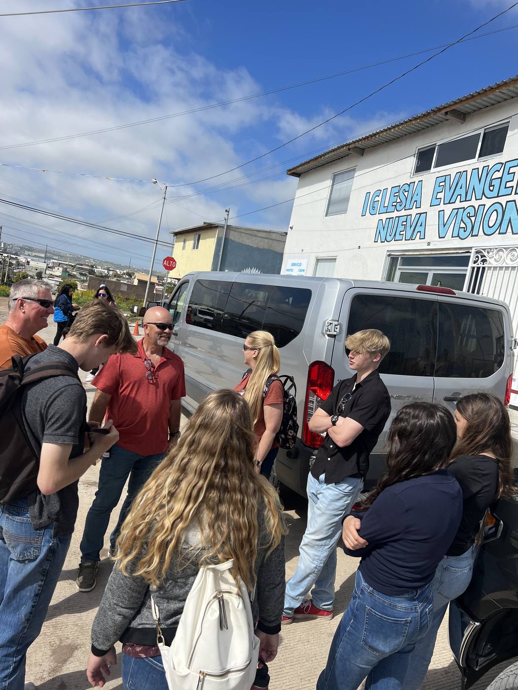 New Hope students gathered outside a church on a mission trip to Mexico