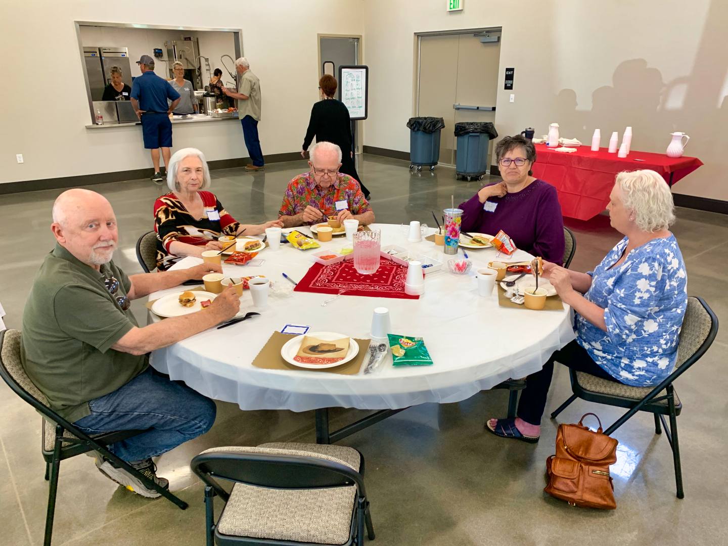 The room full of New Hope seniors gathered for the monthly Senior Lunch in The Barn