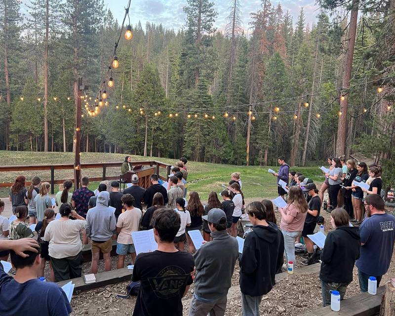 New Hope students in worship at summer camp